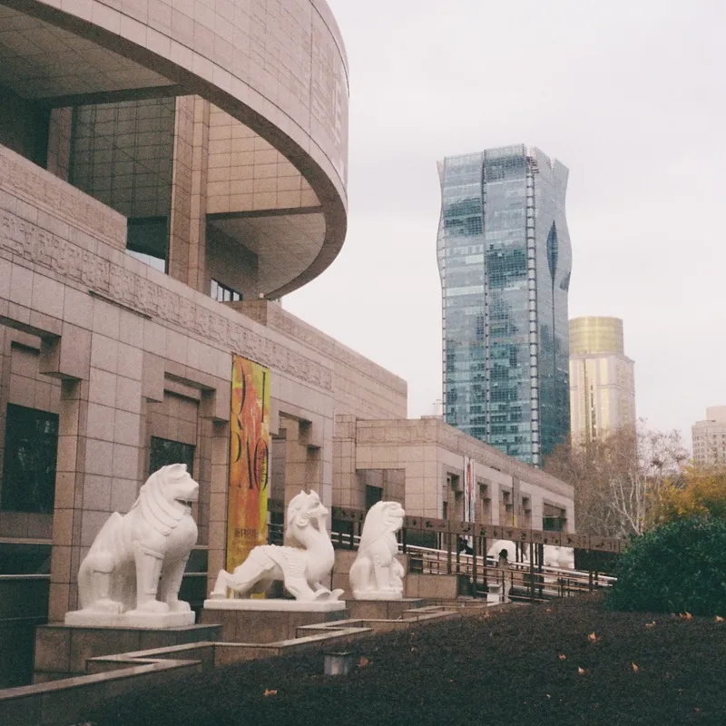 White stone lion sculptures outside the Shanghai Museum